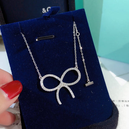 [Dawnora Jewelry]CLAW SET RHODIUM PLATED BOW NECKLACE