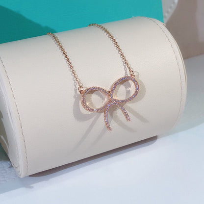 [Dawnora Jewelry]CLAW SET RHODIUM PLATED BOW NECKLACE