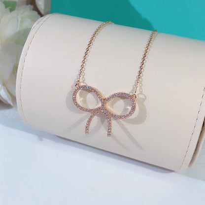 [Dawnora Jewelry]CLAW SET RHODIUM PLATED BOW NECKLACE