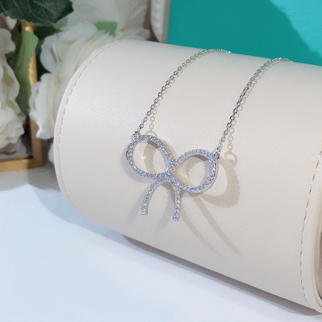 [Dawnora Jewelry]CLAW SET RHODIUM PLATED BOW NECKLACE
