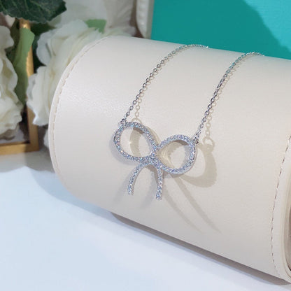 [Dawnora Jewelry]CLAW SET RHODIUM PLATED BOW NECKLACE